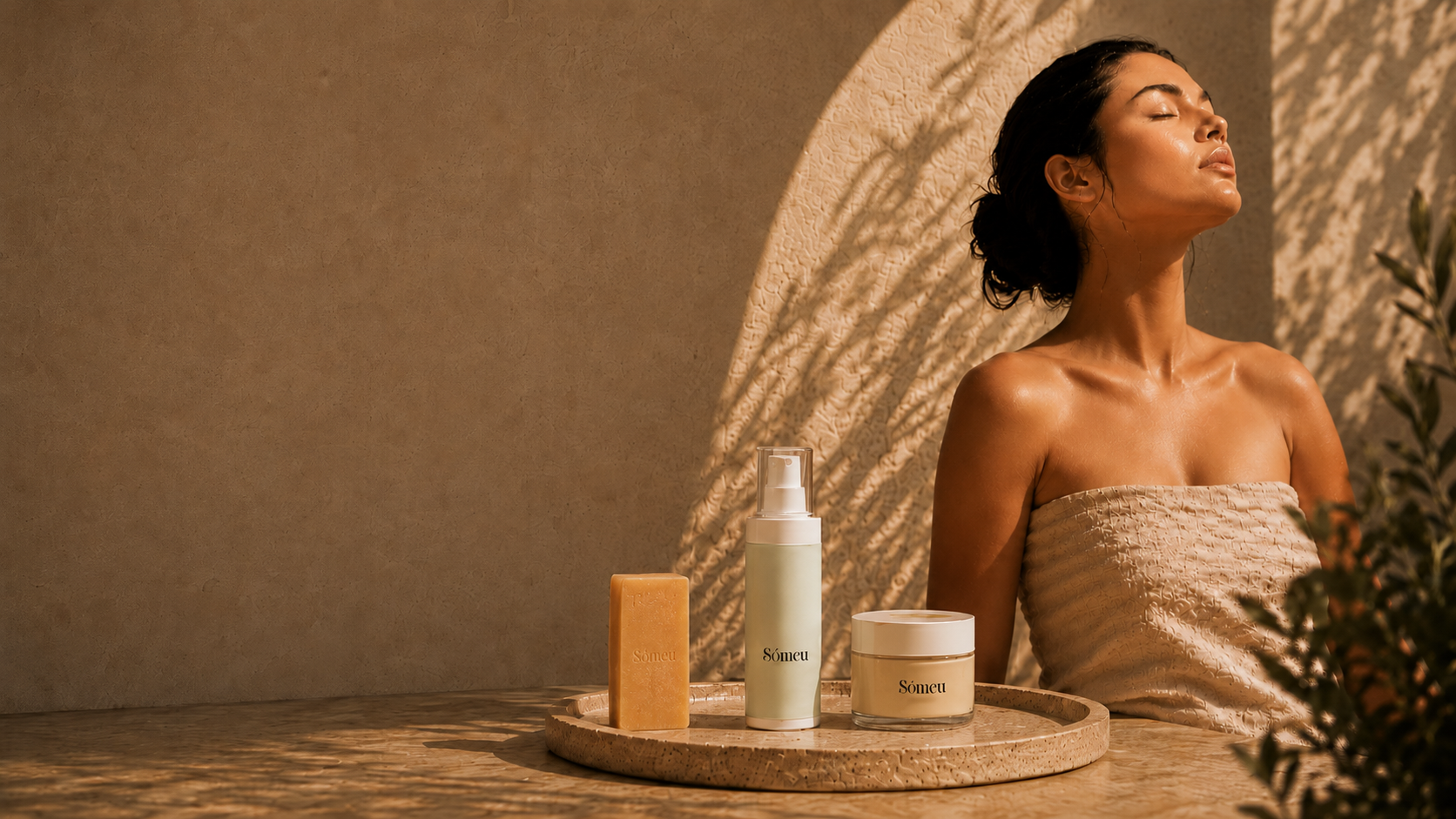 Sómeu bar cleanser, mist concentrate and cream beside a woman in warm sunlight.